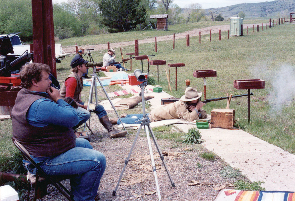 On the firing line at the BPCR Silhouette range, Livingston, Montana, circa 1989-90. Left to right: Mike Venturino observing. Steve Garbe on the scope. Dan Phariss taking the shot. We were young back then!